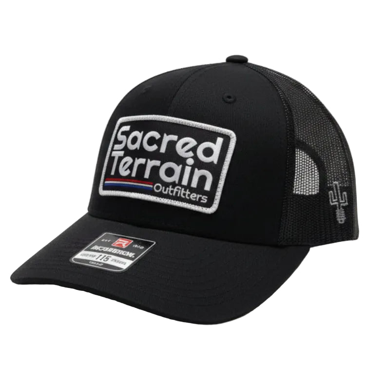 Black cap with a logo on a white surface