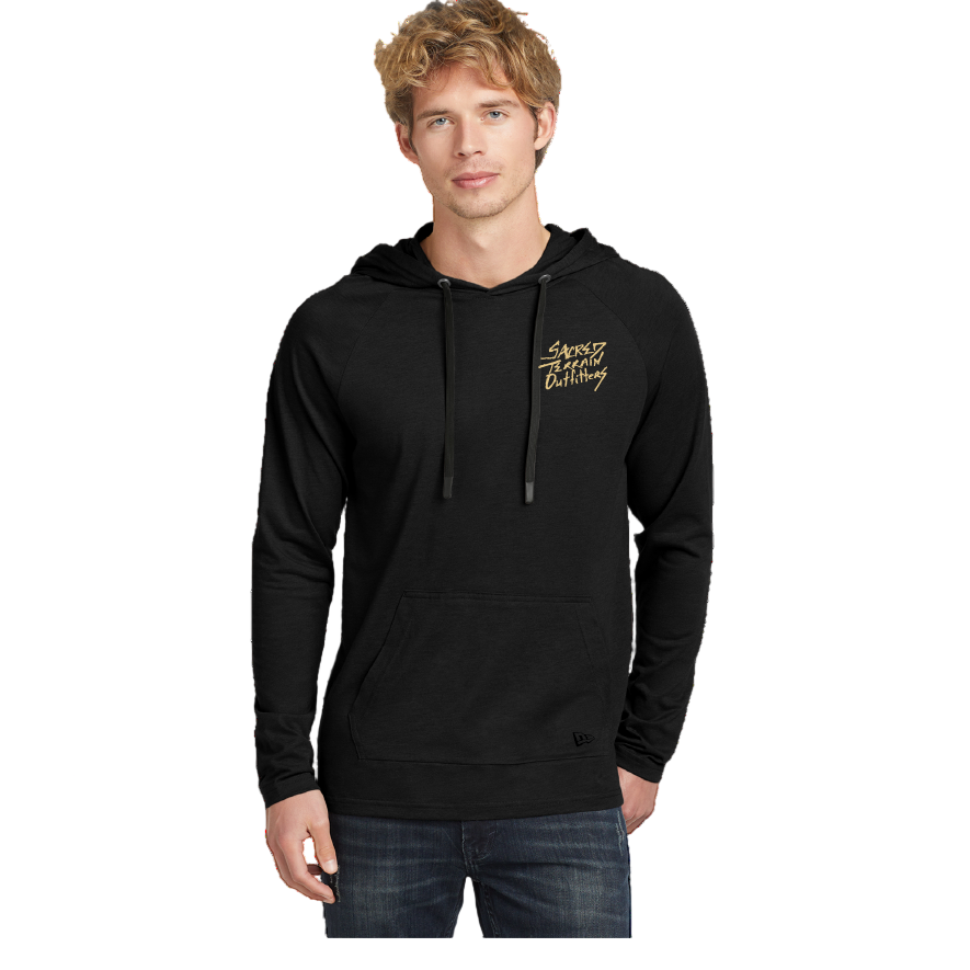 Man wearing a black hoodie with text on a white background