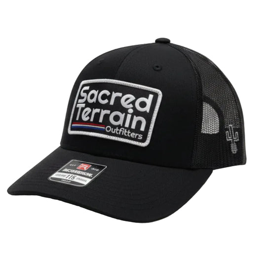 Black cap with a logo on a white surface